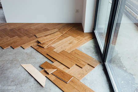 laying herringbone parquet at homeの写真素材