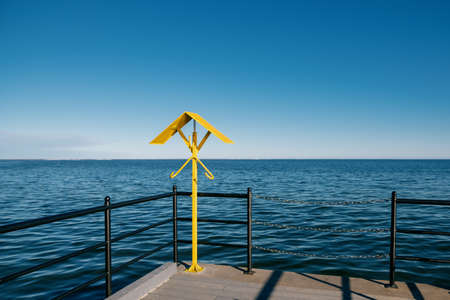 view of the autumn sea from the pierの写真素材