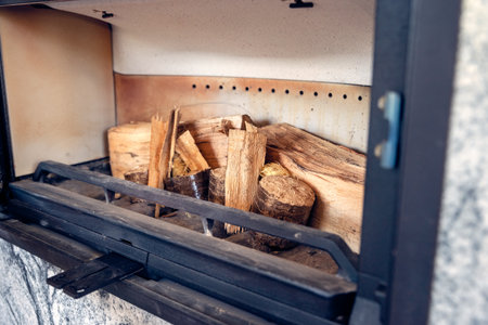 fireplace in the living room with space for woodの写真素材