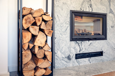 fireplace in the living room with space for woodの写真素材