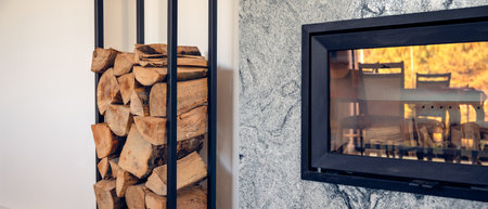 fireplace in the living room with space for woodの写真素材