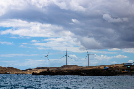 Wind farm working, three wind turbines with the sea view on Tenerife, Canary islands, Spain - Imageの写真素材