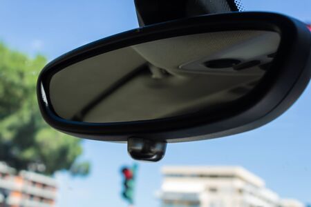 Car rear view mirror closeup, view from inside the car - Imageの写真素材