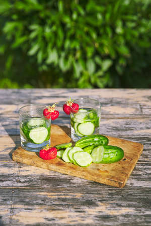 refreshing summer drink made from cucumbers and strawberriesの写真素材