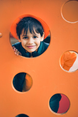 Happy, funny, brave boy on the playground.の写真素材