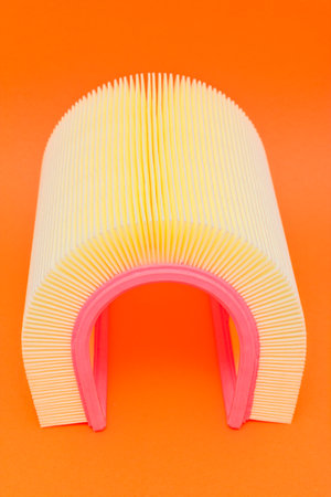 An abstract image of the new air filter. orange backgroundの写真素材