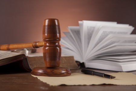 Law concept with wooden table and dark backgroundの写真素材