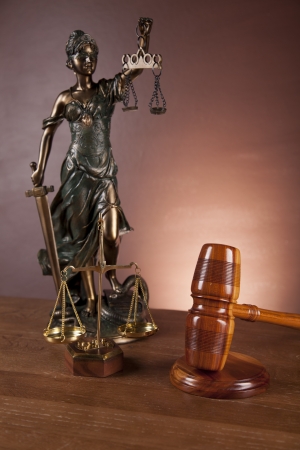 Law and justice stuff on wood table and dark background の写真素材