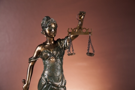 Law and justice stuff on wood table and dark background の写真素材