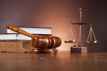 Law and justice stuff on wood table and dark background の写真素材