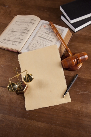 Law and justice stuff on wood table and dark background の写真素材