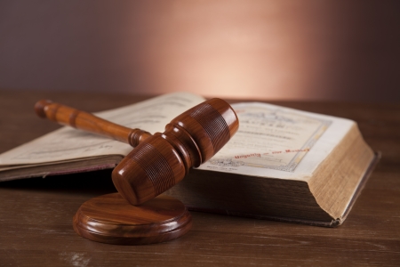 Law and justice stuff on wood table and dark background の写真素材