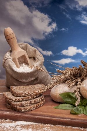 Baking goods and vegetalbes with sky backgroundの写真素材