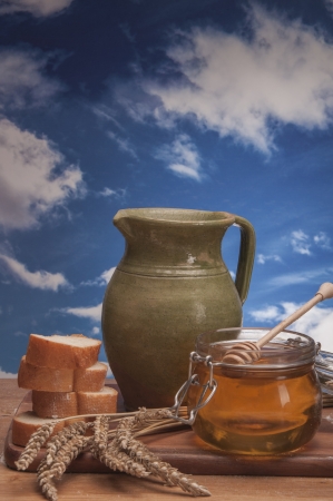 Loaves of bread, rolls and vegetalbes on sky backgroundの写真素材