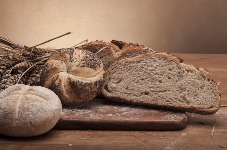 Bread and rolls with brown backgroundの写真素材