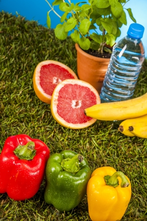 Fitness theme with fruits, blue backgroundの写真素材