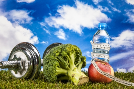 Fitness stuff with light background and friutsの写真素材