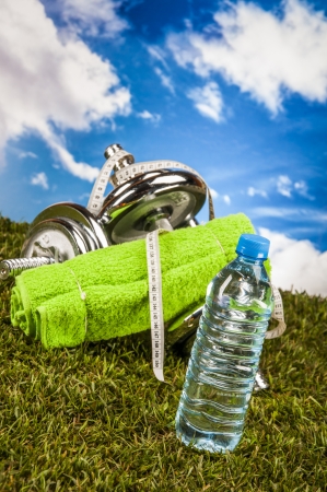 Fitness stuff with light background and friutsの写真素材