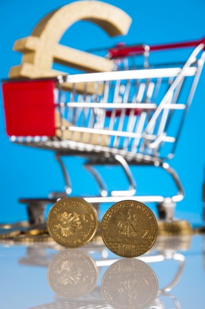 Business theme, gold coins with light backgroundの写真素材