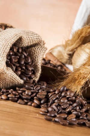 Italian coffee on wooden table with brown backgroundの写真素材