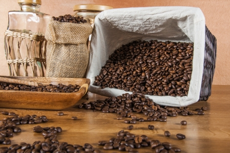 Coffee theme with wooden table and dark backgroundの写真素材
