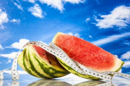 Ftness theme with fruts, vegetables, bright blue backgroundの写真素材