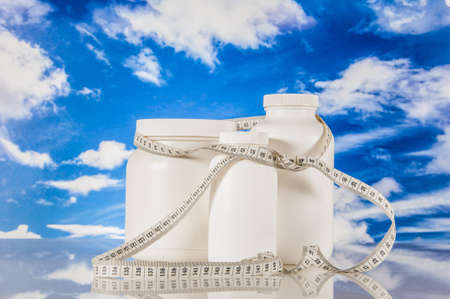Fitness theme with fruits and blue sky backgroundの写真素材