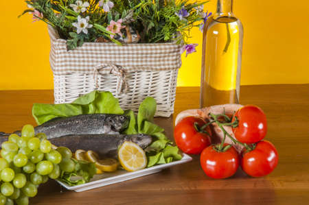 Trout on the plate with vegetablesの写真素材