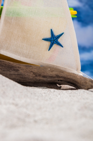 Summer concept with sun, white sand, blue skyの写真素材