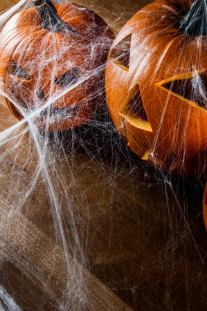 Dark autumn composition with scary pumpkinsの写真素材