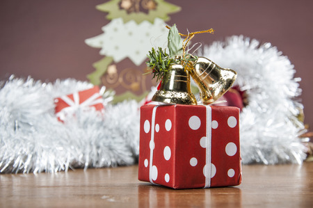 Christmas stuff on wooden table with dark backgroundの写真素材