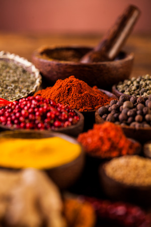 Spices in Indonesian wooden bowlsの写真素材