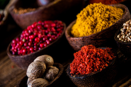 Hot spices in bowls, oriental themeの写真素材
