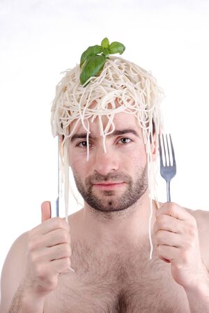 Funny man with spaghetti on head, white backgroundの写真素材