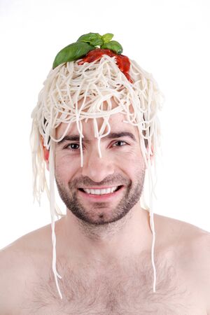 Funny man with spaghetti on head, white backgroundの写真素材