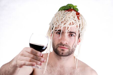 Funny man with spaghetti on head, white backgroundの写真素材