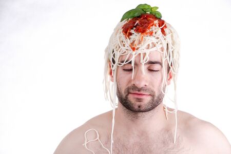 Funny man with spaghetti on head, white backgroundの写真素材
