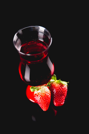Cold tasty drink on black backgroundの写真素材