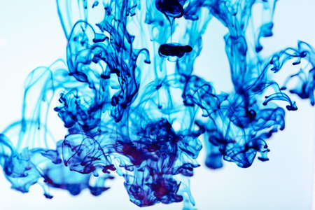 Blue ink in water, artistic shot, abstract backgroundの写真素材