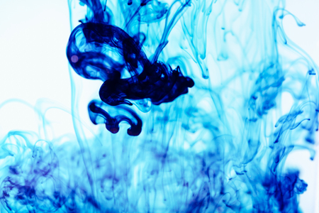 Blue ink in water, artistic shot, abstract backgroundの写真素材