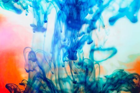 Blue ink in water, artistic shot, abstract backgroundの写真素材