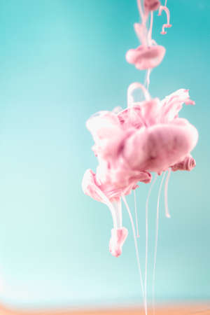Pink ink in water, artistic shot, abstract backgroundの写真素材