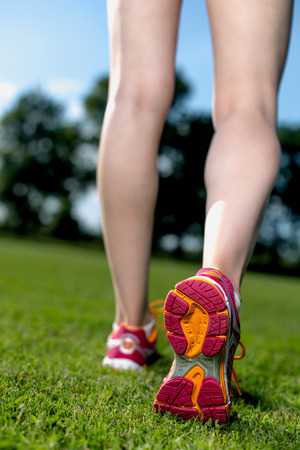 Close up young girls shoes, training summer time conceptの写真素材