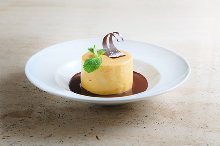 Round cake with temperate chocolateの写真素材