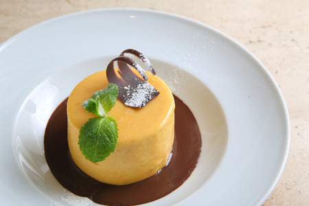 Round cake with temperate chocolateの写真素材