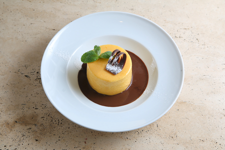 Round cake with temperate chocolateの写真素材