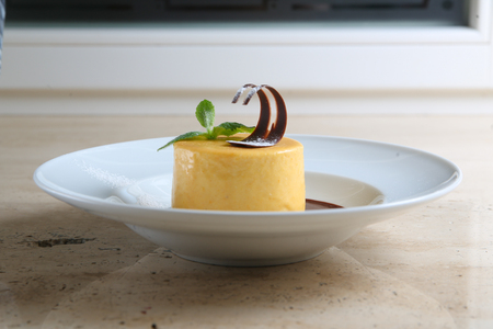 Round cake with temperate chocolateの写真素材