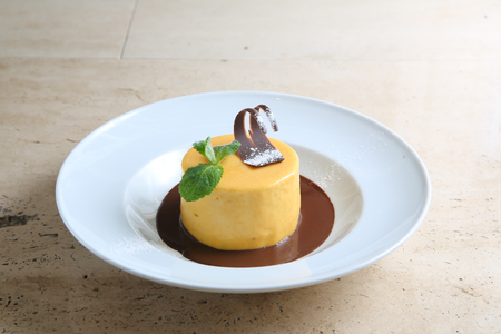 Round cake with temperate chocolateの写真素材