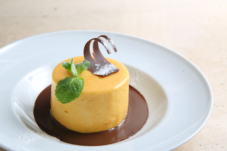 Round cake with temperate chocolateの写真素材
