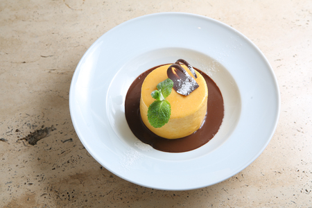 Round cake with temperate chocolateの写真素材